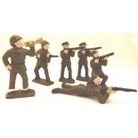 Six metal soldier figures