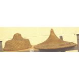 Two woven bamboo Chinese hats from the e