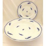 Two blue and white dishes marked with cr