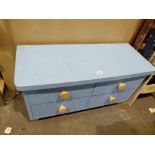 Childs blue low four drawer cabinet