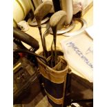 Vintage golf clubs in case