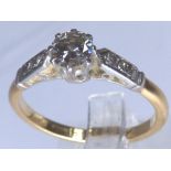 18ct gold diamond solitaire with diamond shoulders, approximately 0.