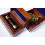 Box containing sundial and boxed monocular