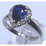 Diamond and 2 ct pear cut sapphire set ring in 18ct white gold,