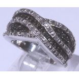 Sterling silver fancy black and white stone set ring,