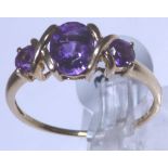 9 ct gold amethyst three stone ring,