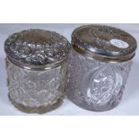 Two silver topped dressing table pots,