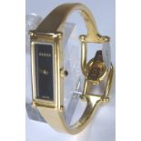 Ladies gold plated genuine Gucci bangle wristwatch