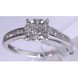 9 ct white gold diamond cluster ring, approximately 0.