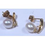 Pair of 14 ct yellow gold pearl set earrings