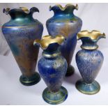 Two pairs of Loetz style vases,