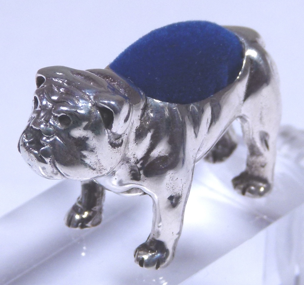 Silver pin cushion in the form of a bulldog