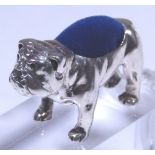 Silver pin cushion in the form of a bulldog