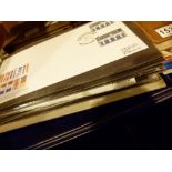 Two albums containing approx 100 First Day Covers