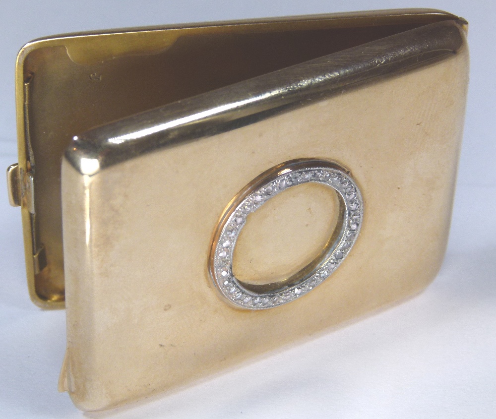 Matchbook case in 9 ct gold decorated with circle of diamonds, 36.