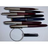 Seven Parker pens,