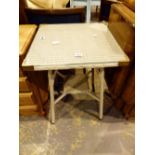 Glass topped wicker garden table,