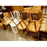 Eight Ercol stickback beech dining chairs