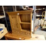 Pine wall cupboard with four drawers,