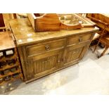 Small stained oak sideboard with two drawers and a double door cupboard, H: 70 cm,