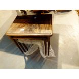 Nest of three glass top mahogany tables