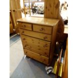 Pair of six drawer pine chest and a pine headboard