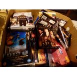 Box of mixed DVDs