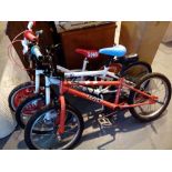 Three childrens BMX bikes