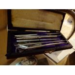 Cased set of dentistry tools