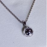 18 ct white gold diamond ball pendant on an 18 ct white gold chain with AGI certificate and