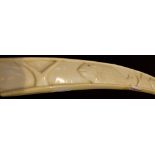 Carved faux ivory tusk,