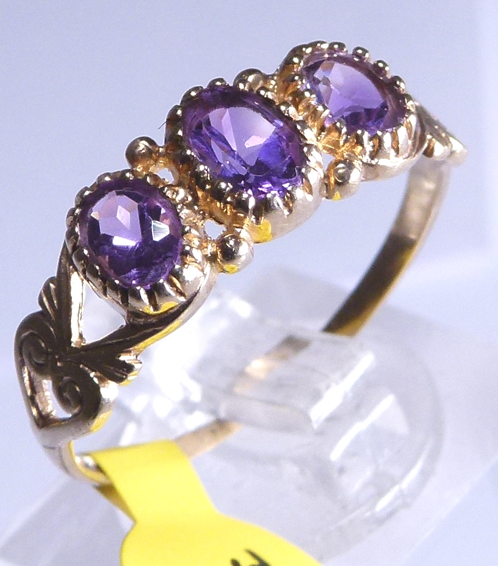 9ct gold amethyst three stone ring,