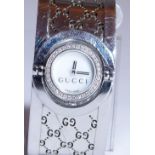 Ladies Gucci 32 diamond set dial swivel head model 112 stainless steel wristwatch,