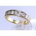 18 ct yellow gold diamond set eternity ring, set with seven diamonds, approximately 1.