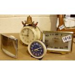 Collection of four alarm clocks including novelty example