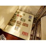 Album of worldwide postage stamps