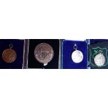 Bronze and silver Loughborough college medals,