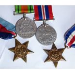 Four WWII medals and ribbons