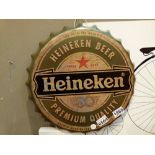 Heineken bottle top sign