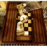 Chess set with tambour door cased board and two glass paperweights