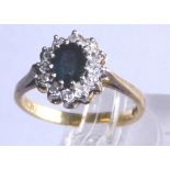 Sapphire and diamonds set in 18 ct yellow gold ring, Size M.