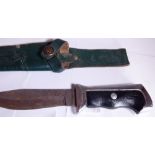 Leather sheathed hunting knife