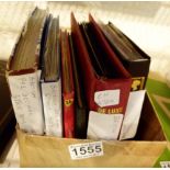 Box of British albums including stock books,