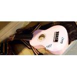 Small pink ukelele