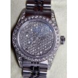 Ladies Rolex wristwatch with pave set dial and diamond bezel on a Rolex steel bracelet,