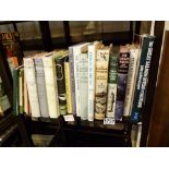 Shelf of fishing and gardening books