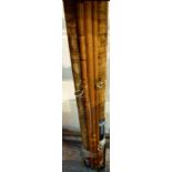 Two split cane fishing rods,