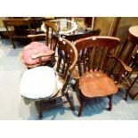 Four dining chairs including two carvers