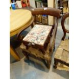 Antique hallway arm chair with upholstered seat and a stool
