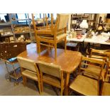Extending dining table and four chairs